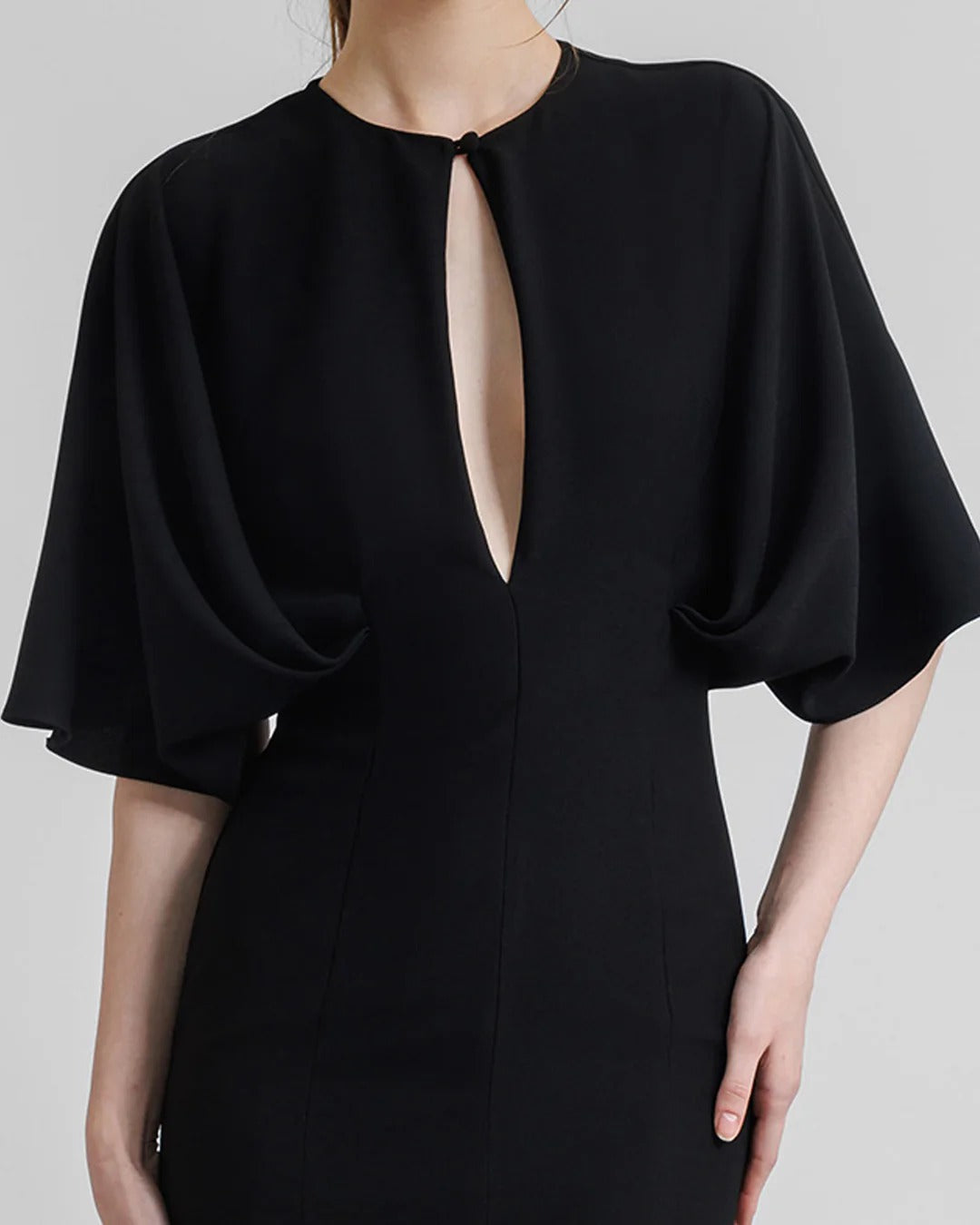 Dress With Cape-Like Sleeves